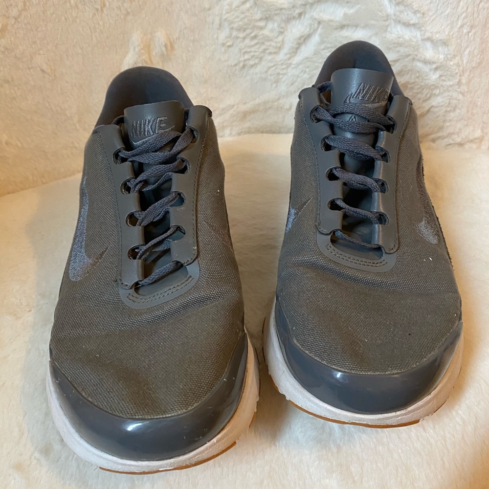 grey nike athletic shoes